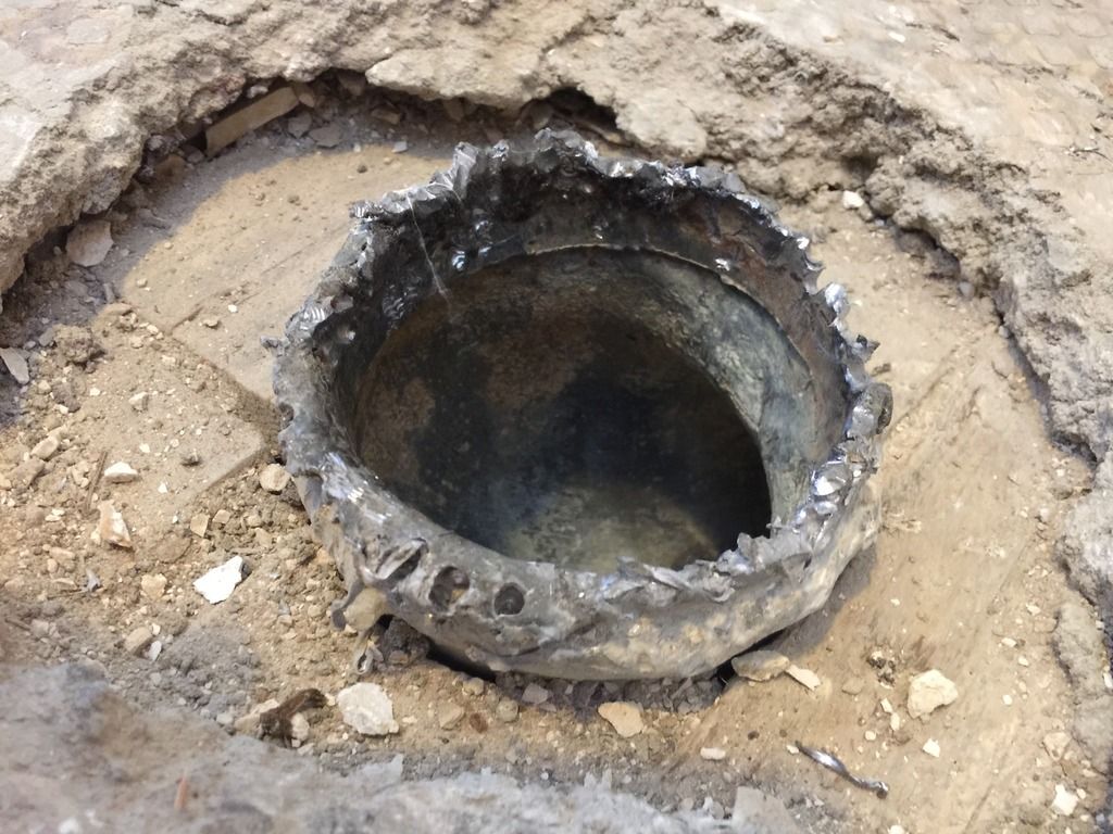 toilet drain in old apartment